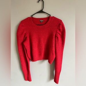 Cute red sweater. Very warm and soft material.